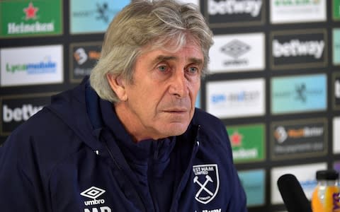 Manuel Pellegrini of West Ham United listens to a question during his press conference at Rush Green on December 12, 2019 in Romford, England - Credit: Getty Images