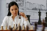 Kazakh chess player and social activist Dinara Saduakassova poses for a picture in the Chess Academy in Nur-Sultan