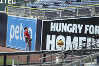 Arizona Diamondbacks Kole Calhoun watches as San Diego Padres Francisco Mejía's home run stays fair in the third inning of a baseball game Sunday, Aug. 9, 2020, in San Diego. (AP Photo/Derrick Tuskan)