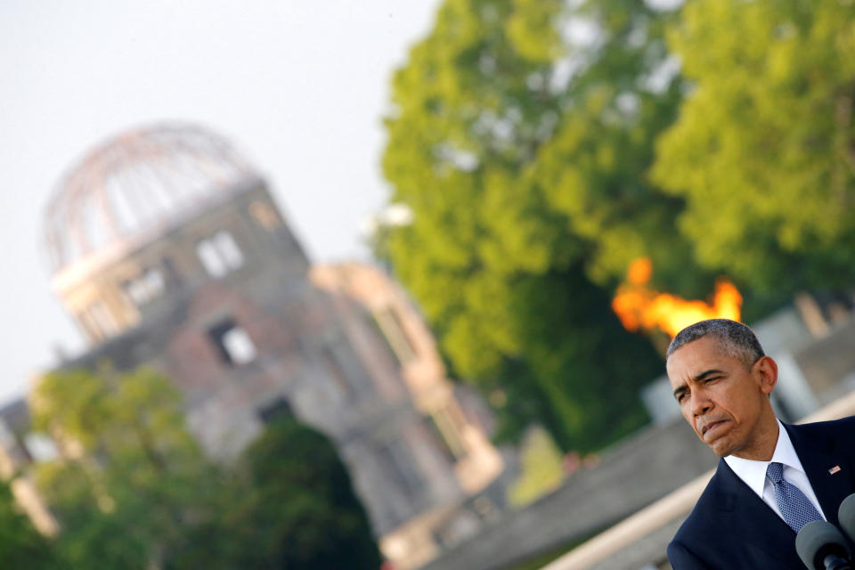 <p>President Barack Obama and Japan’s Prime Minister Shinzo Abe (not pictured) attends a ceremony at the Atomic Bomb Dome at Peace Memorial Park in Hiroshima, Japan May 27, 2016. (Photo: Carlos Barria/Reuters) </p>