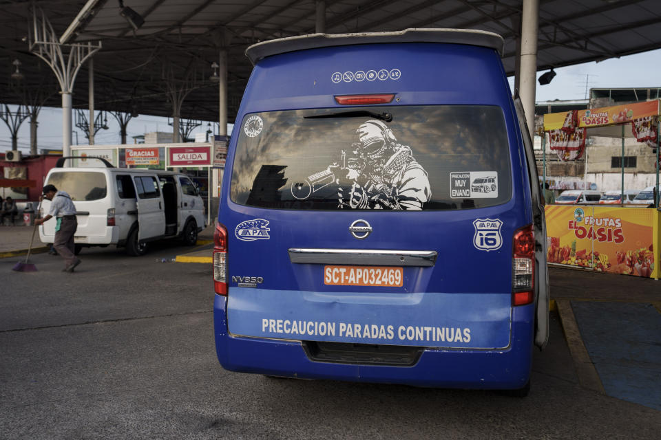 Passenger vans are parked at a station in Tapachula, Mexico, Thursday, Jan. 19, 2023. As Central American street gangs have moved operations into southern Mexico, drivers of the passenger vans and taxis have raised the alarm, holding temporary work stoppages to get authorities’ attention. (AP Photo/Moises Castillo)