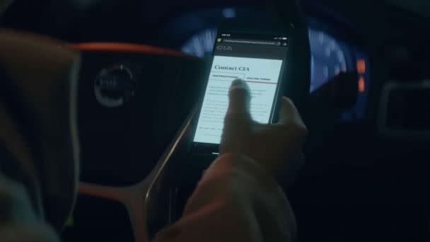 PHOTO: In a still from a Central Intelligence Agency video aimed at recruiting Russians spies, someone is shown contacting the CIA on their phone. (Central Intelligence Agency)