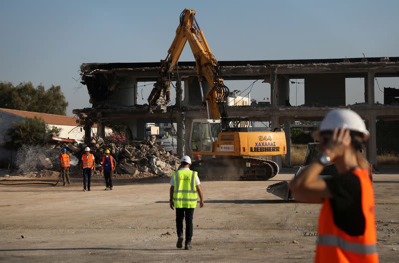 Greek Prime Minister Kyriakos Mitsotakis and Lamda Development CEO Odisseas Athanasiou attend an inaugural ceremony of works at the disused Hellenikon airport in Athens