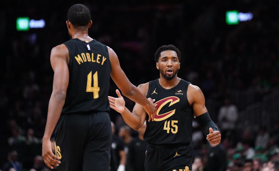 Cavaliers guard Donovan Mitchell (45) reacts after a first-quarter basket by forward Evan Mobley against the Celtics in Game 2 of the Eastern Conference semifinals, May 9, 2024, in Boston.