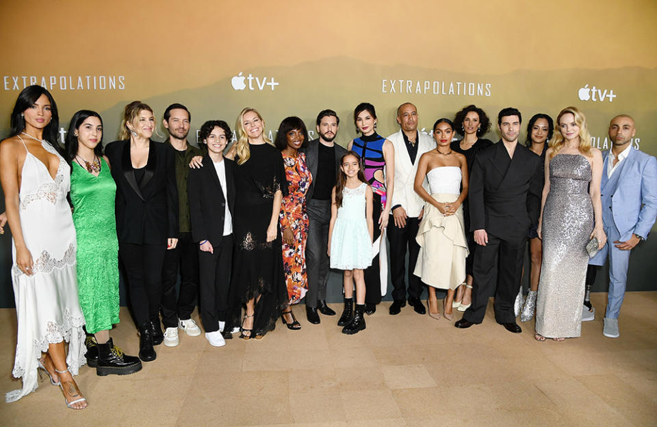 (L-R) Eiza González, Neska Rose, Tara Summers, Tobey Maguire, Joaopaulo Malheiro, Sienna Miller, Maame Yaa Boafo, Kit Harington, Bella Patel Sauer, Gemma Chan, Ben Harper, Yara Shahidi, Indira Varma, Tahar Rahim, Devika Bhise and Heather Graham attend the Apple Original Series "Extrapolations" red carpet premiere event at Hammer Museum on March 14, 2023 in Los Angeles, California.