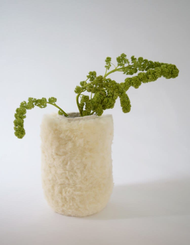 Yes, you're looking at a woolly vase! (It's got a removable glass liner to make it functional.) <a rel="nofollow noopener" href="https://www.karentinney.com/home-decor/vase-532" target="_blank" data-ylk="slk:SHOP NOW;elm:context_link;itc:0;sec:content-canvas" class="link ">SHOP NOW</a>: Vase #532 by Karen Gayle Tinney, $375, karentinney.com