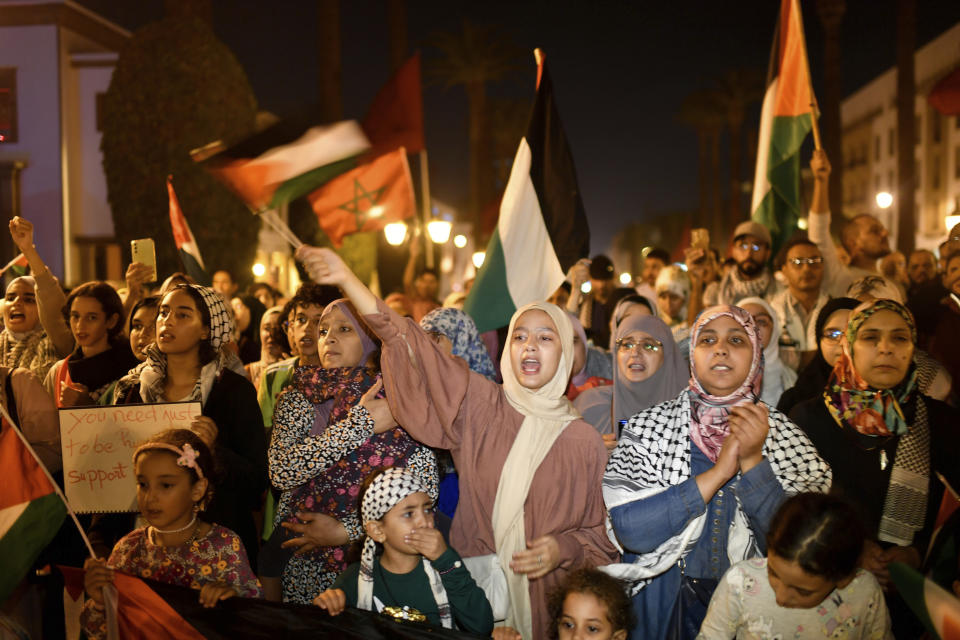 Hundreds of Moroccans take part in a protest in solidarity with Palestinians in Gaza, following the bombing of AlAhli hospital, in Rabat, Morocco, Tuesday, Oct. 17, 2023. (AP Photo)