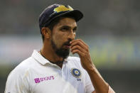 India's Ishant Sharma, who took five wickets, stands in the field during the first day of the second test match between India and Bangladesh, in Kolkata, India, Friday, Nov. 22, 2019. (AP Photo/Bikas Das)