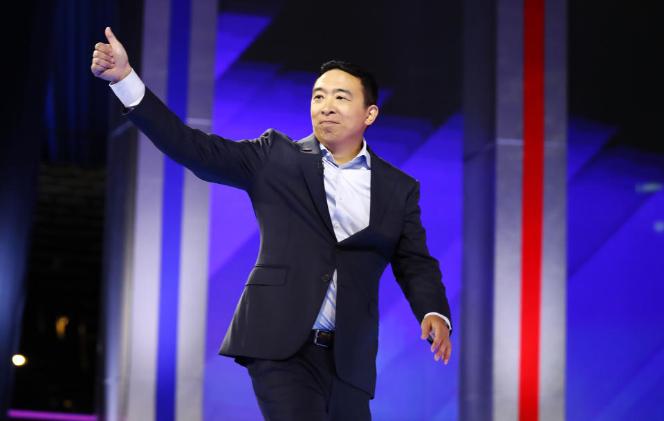 Andrew Yang takes the stage for the start of the Democratic presidential debate in Houston last Thursday. (Photo: Jonathan Bachman/Reuters)