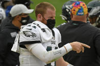 Philadelphia Eagles quarterback Carson Wentz (11) walks on the sideline during the second half of an NFL football game against the Pittsburgh Steelers in Pittsburgh, Sunday, Oct. 11, 2020. (AP Photo/Don Wright)
