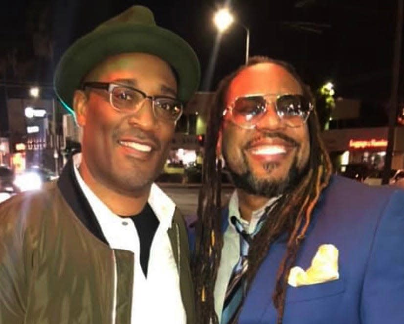 Boyhood friends George Tillman Jr., left, and columnist James E. Causey reunite in Los Angeles in July 2020.