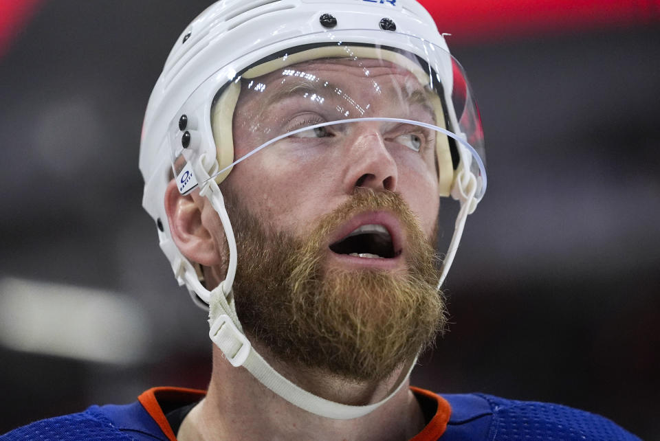Edmonton Oilers defenseman Mattias Ekholm looks up at a replay during the second period of the team's NHL hockey game against the Chicago Blackhawks on Tuesday, Jan. 9, 2024, in Chicago. (AP Photo/Erin Hooley)