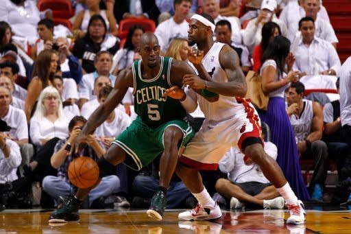 Boston Celtics' Kevin Garnett (L) and Miami Heat's LeBron James during game five of their NBA Eastern Conference finals on June 5. Boston and will advance with a home win in game six on Thursday