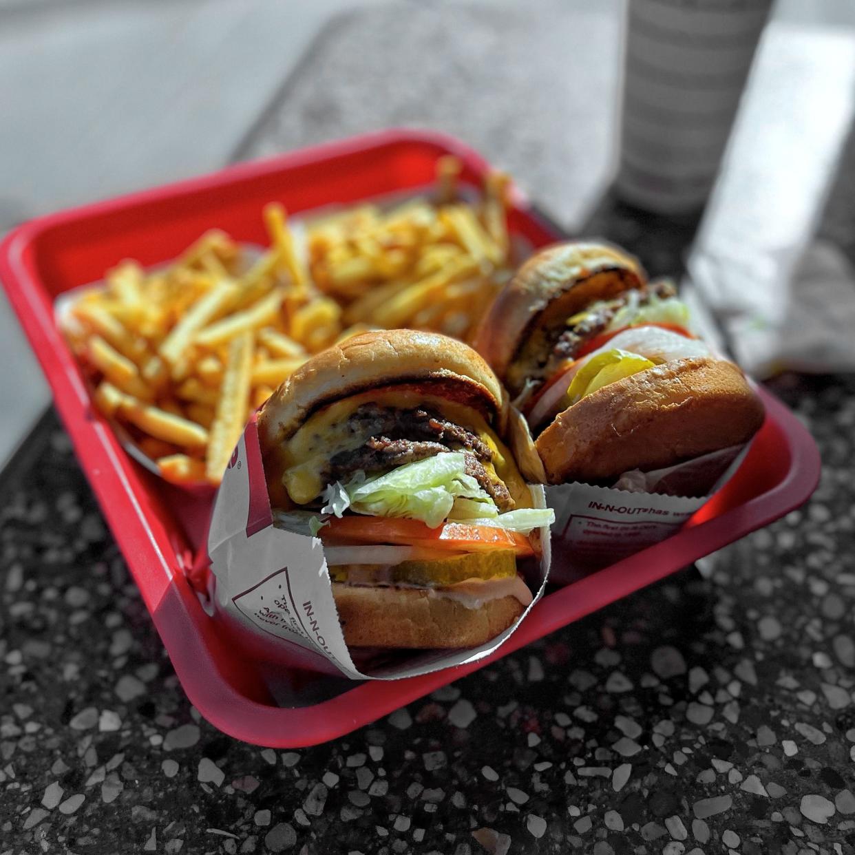 two burgers and fries from In-N-Out Burger