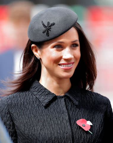 <p>On April 25, Meghan commemorated Anzac Day for the first time. For the afternoon’s service, she dressed in a textured ensemble by Emilia Wickstead. She finished the look with sleek hair and a coordinating Philip Treacy hat. (Photo: Getty Images) </p>