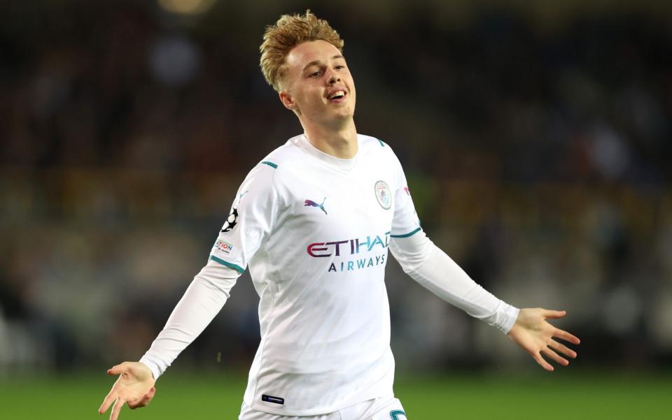 Cole Palmer of Manchester City celebrates after scoring their side's fourth goal during the UEFA Champions League group A match between Club Brugge KV and Manchester City at Jan Breydel Stadium on October 19, 2021 in Brugge - GETTY IMAGES