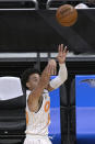 Orlando Magic guard Devin Cannady attempts a 3-point shot during the second half of the team's NBA basketball game against the New Orleans Pelicans, Thursday, April 22, 2021, in Orlando, Fla. (AP Photo/Phelan M. Ebenhack)