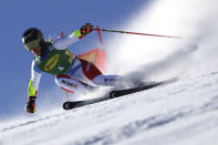 Switzerland's Lara Gut-Behrami speeds down the course during an alpine ski, women's World Cup giant slalom, in Soelden, Austria, Saturday, Oct. 23, 2021. (AP Photo/Marco Trovati)