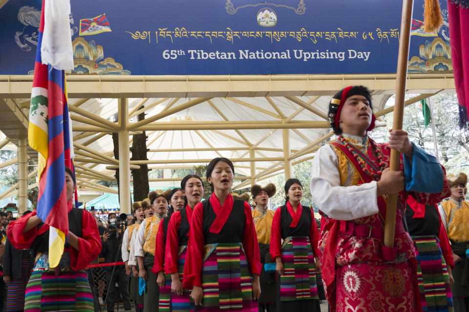 Exile Tibetan artists play a song at an event commemorating the 1959 uprising in Tibet on this day, in Dharamshala, India, Sunday, March 10, 2024. (AP Photo/Ashwini Bhatia)