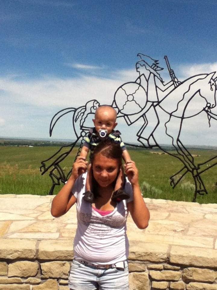 Hanna Harris holds her son, Jeremiah, on her shoulders. Hanna was killed in 2013 when Jeremiah was 10 months old.