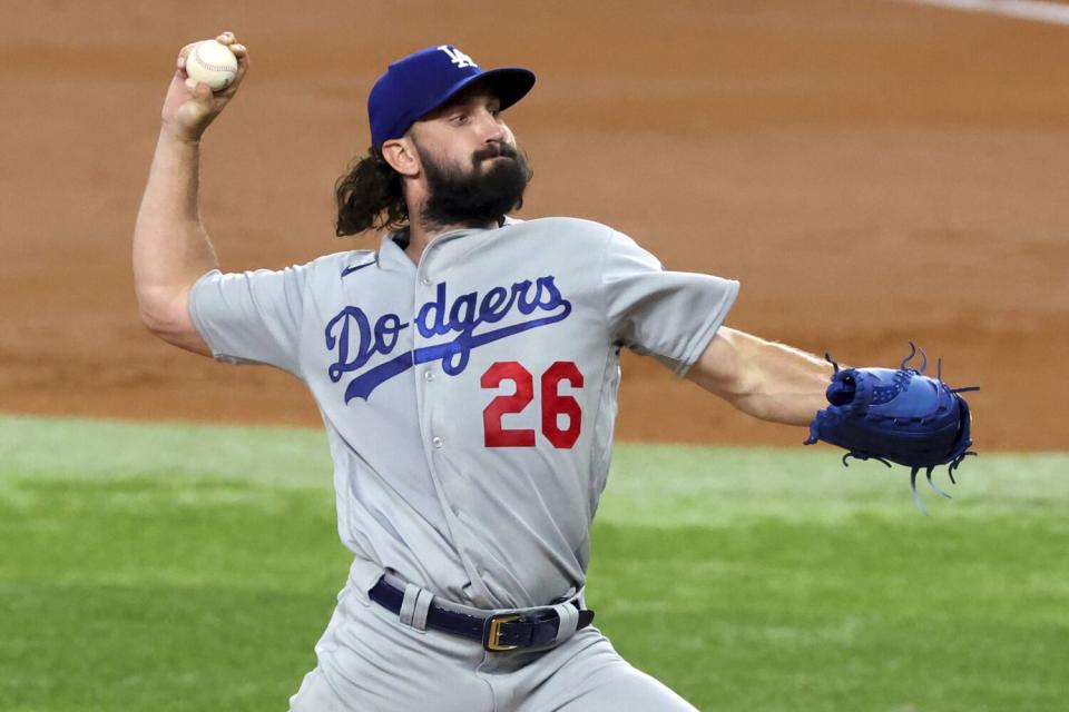 Dodgers starting pitcher Tony Gonsolin delivers against the Texas Rangers in the first inning Friday.