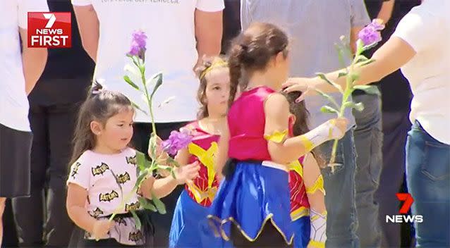 Kids dressed as superheroes at Zane's funeral. Source: 7 News