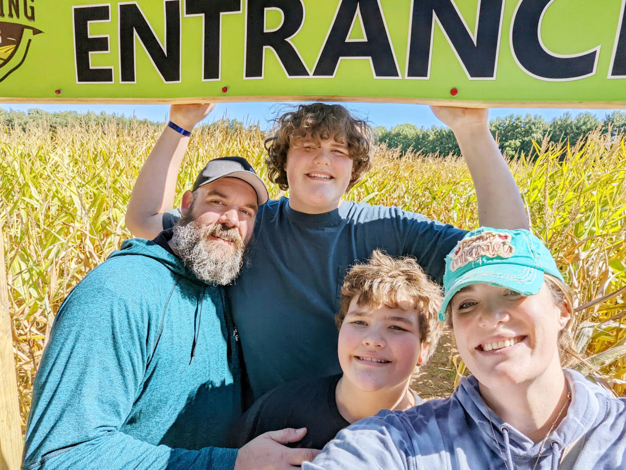 Eric Jr., pictured with his parents and brother, wears a size 23 shoe. (Courtesy Rebecca Kilburn)