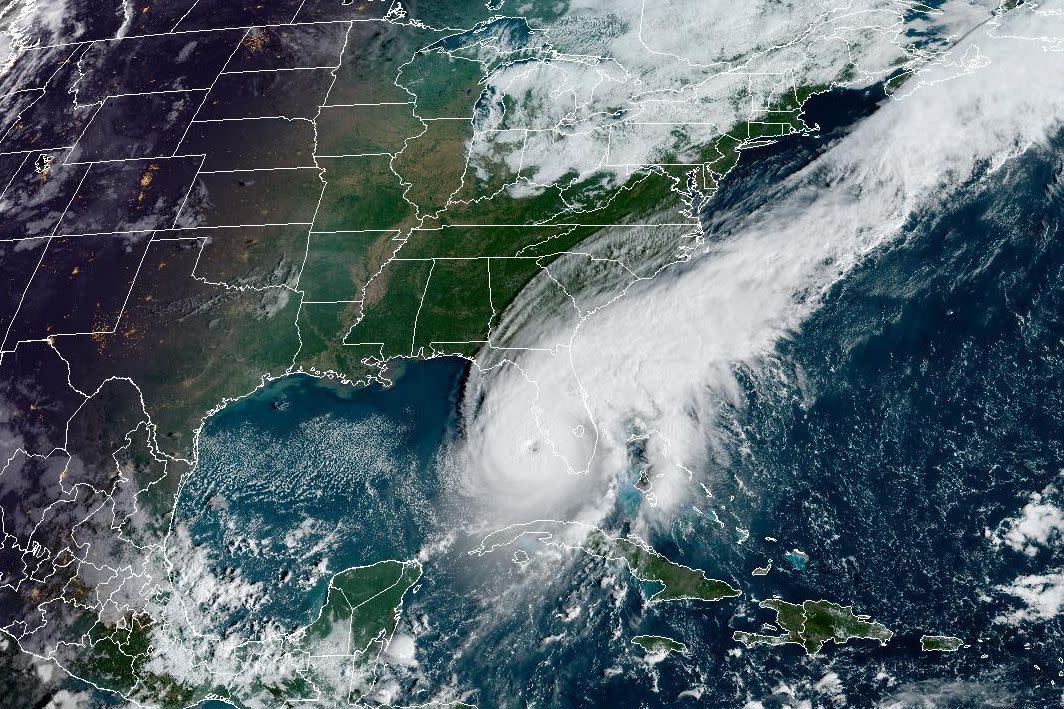 In this NOAA handout image taken by the GOES satellite at 13:26 UTC, Hurricane Ian moves toward Florida on Sept. 28, 2022, in the Gulf of Mexico. The storm is expected to bring a potentially life-threatening storm surge and hurricane-force winds.