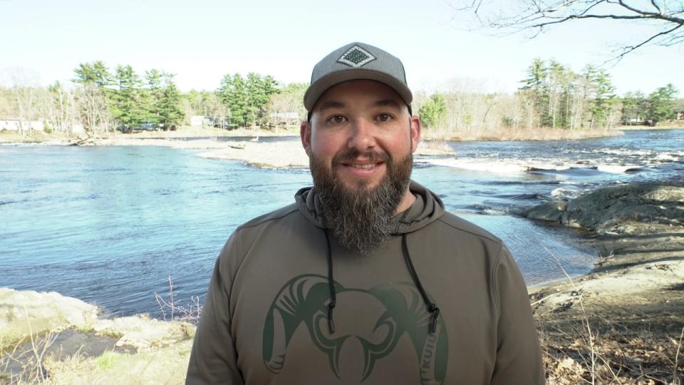 Chuck Loring, natural resources director for the Penobscot Nation, poses near Maine's Penobscot River. 