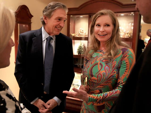 <p>Essdras M Suarez/The Boston Globe/Getty</p> Albert DePrisco and Lisa Niemi Swayze at a book signing event in 2013