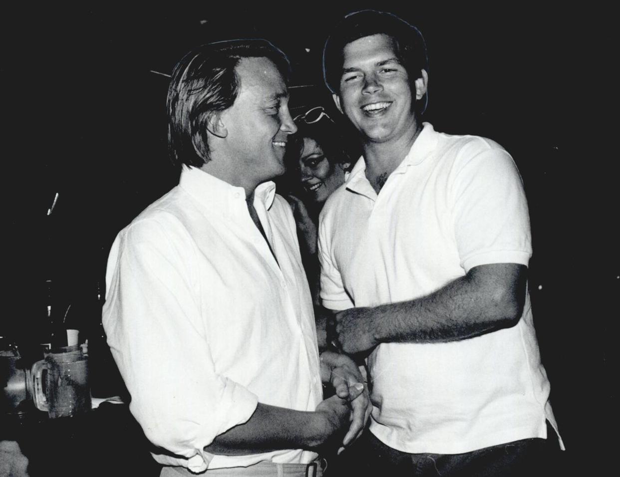 Charlie Givens is shown visiting with oilman Steve Wetwiska in this 1983 photo. Oklahoman Archives