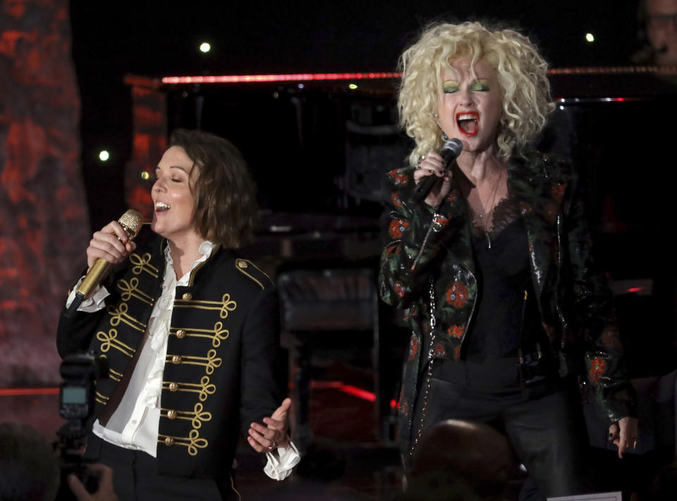 Brandi Carlile, left, and Cyndi Lauper perform on stage at the Pre-Grammy Gala And Salute To Industry Icons at the Beverly Hilton Hotel on Saturday, Jan. 25, 2020, in Beverly Hills, Calif. (Photo by Willy Sanjuan/Invision/AP)