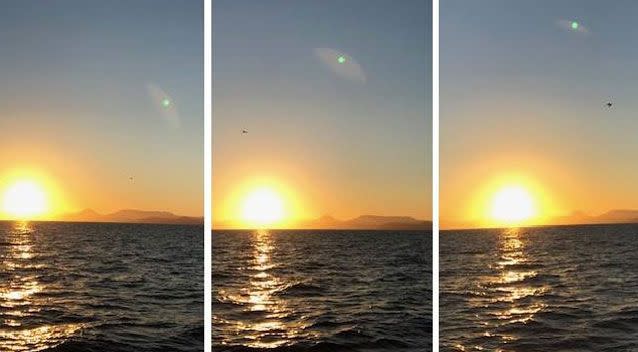 Jenny Morrison photographed what she believes is a UFO hovering above the Great Barrier Reef