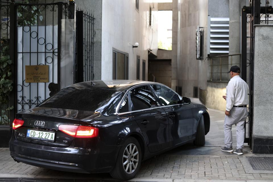 A car enters the Iranian Embassy in Tirana, Albania, Wednesday, Sept. 7, 2022. Albania cut diplomatic ties with Iran and expelled the country's embassy staff over a major cyberattack nearly two months ago that was allegedly carried out by Tehran on Albanian government websites, the prime minister said Wednesday. (AP Photo/Franc Zhurda)