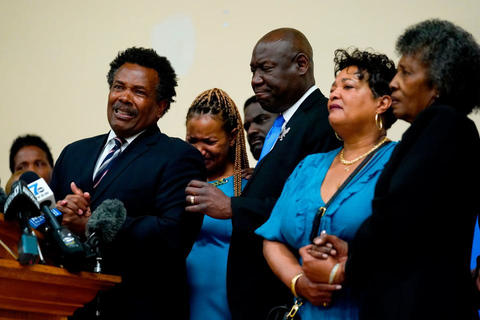 Garnell Whitfield Jr., left, the son of Ruth Whitfield, a victim of shooting at a supermarket, speaks with members of the media during a news conference in Buffalo, N.Y., Monday, May 16, 2022. (AP Photo/Matt Rourke) ORG XMIT: NYMR122