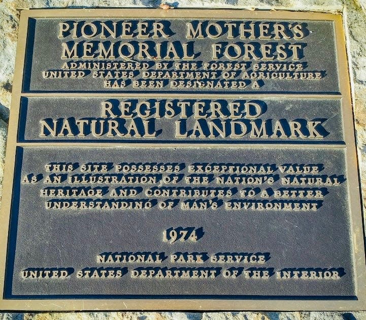 A plaque at the Pioneer Mothers Memorial Forest commemorates the land as a Registered National Landmark.