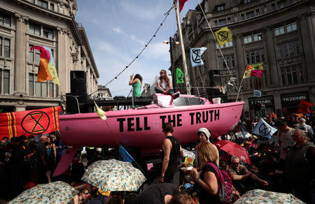 Climate change activists gather at Oxford Circus during the Extinction Rebellion protest in London, Britain April 18, 2019. REUTERS/Simon Dawson