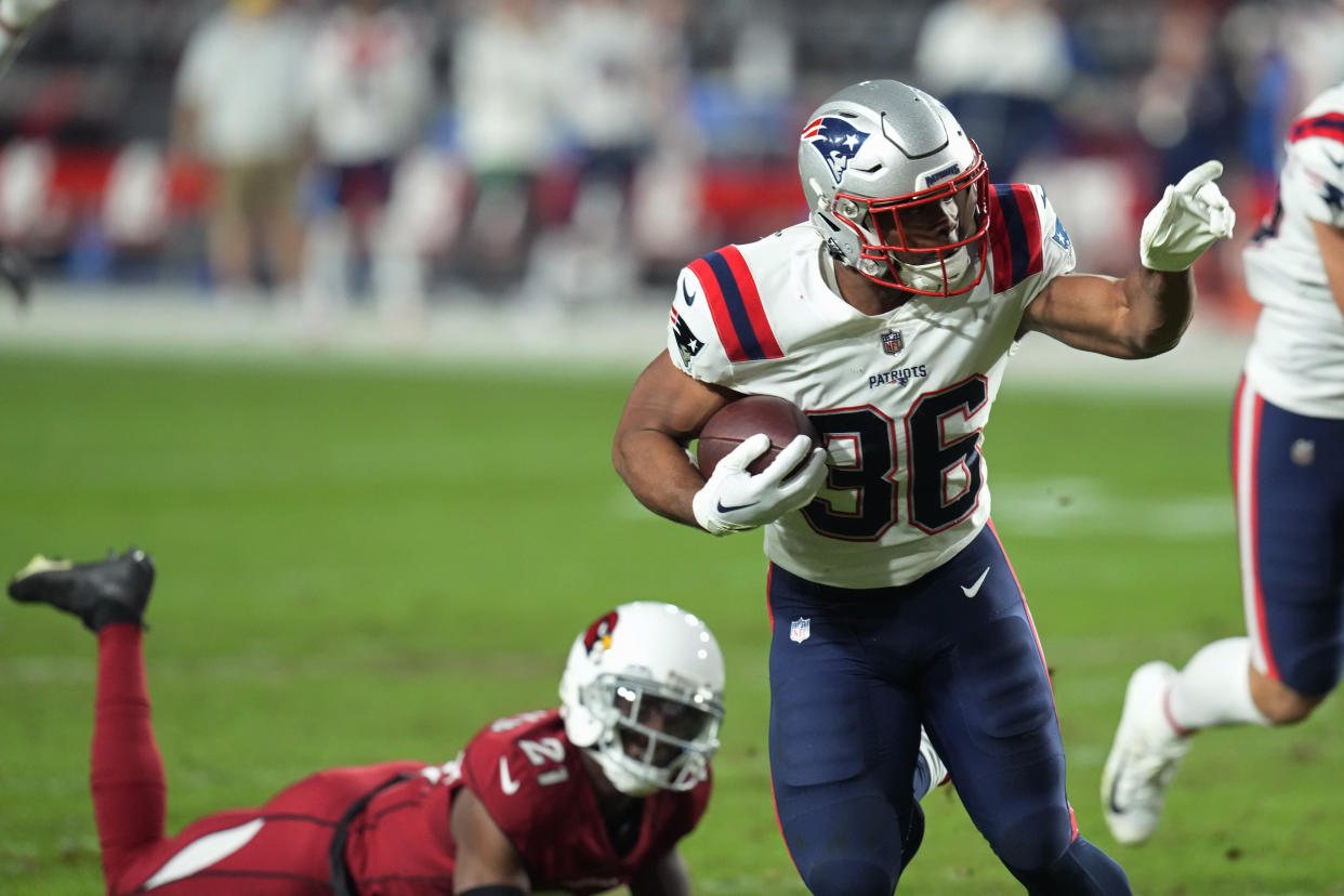 New England Patriots running back Kevin Harris (36) celebrates scoring a touchdown against the Arizona Cardinals. (AP Photo/Ross D. Franklin)