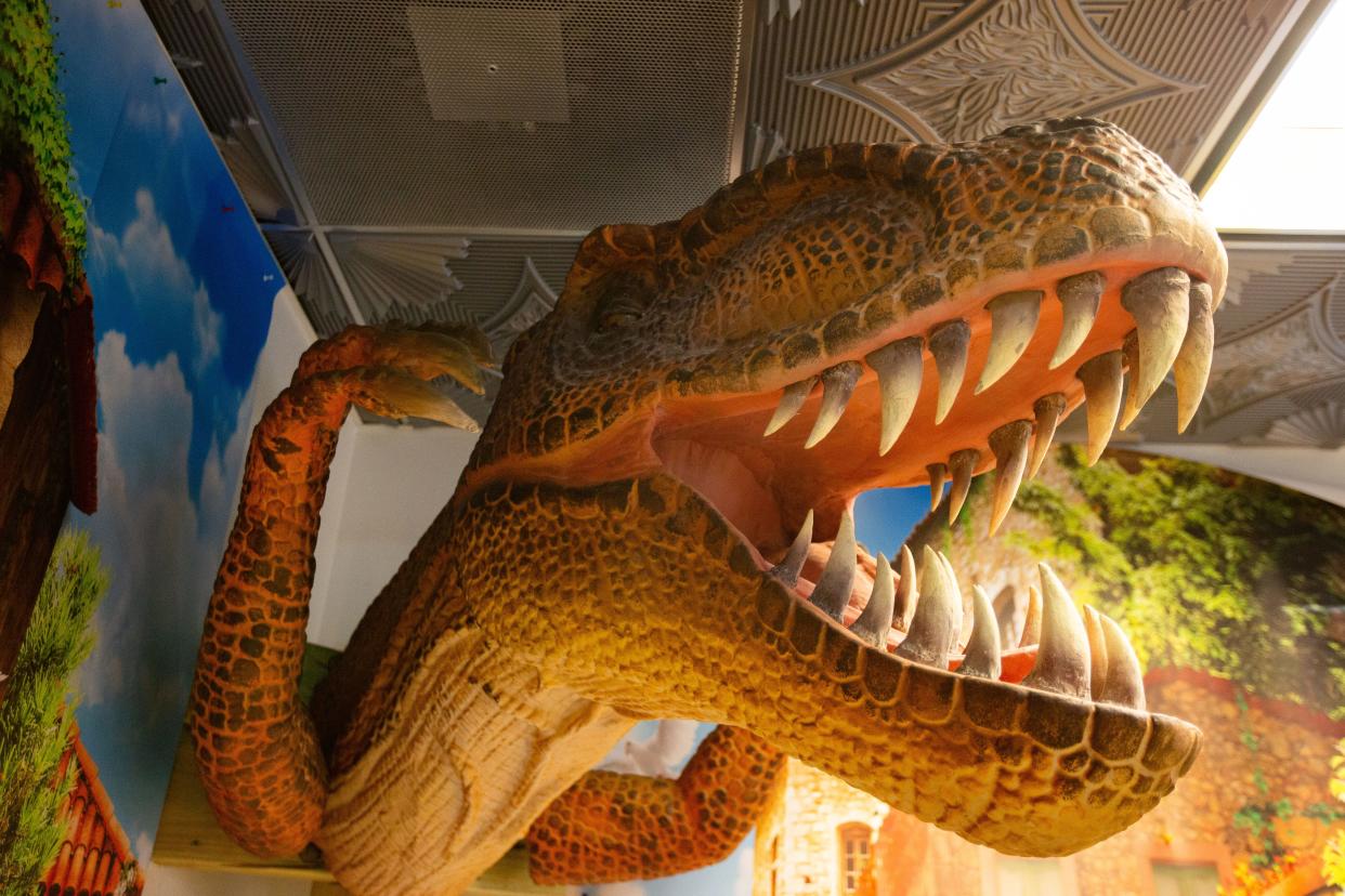 An animatronic dinosaur is displayed on a wall inside the new Growler Country location in Killearn Lakes, which is planned to open later this year.