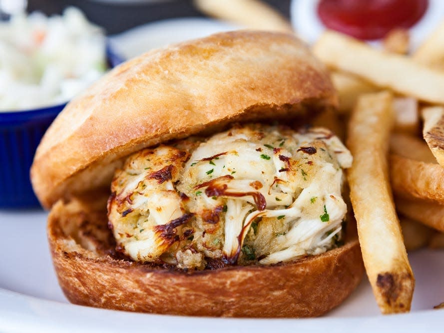 Crab cake sandwich with fries