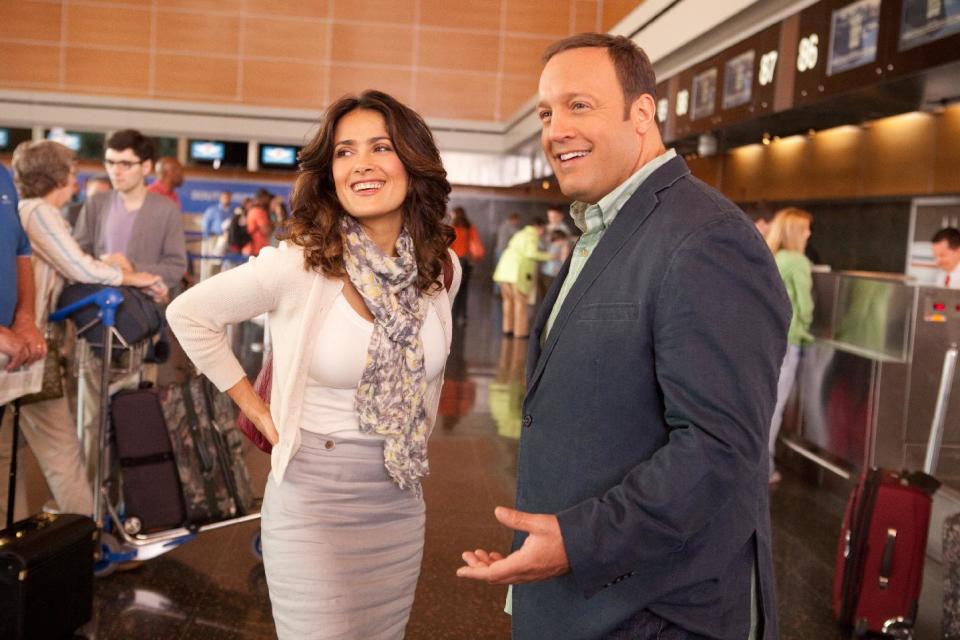 This film image released by Columbia Picturers shows Salma Hayek, left, and Kevin James in a scene from "Here Comes the Boom." (AP Photo/Columbia-Sony Pictures, Tracy Bennett)