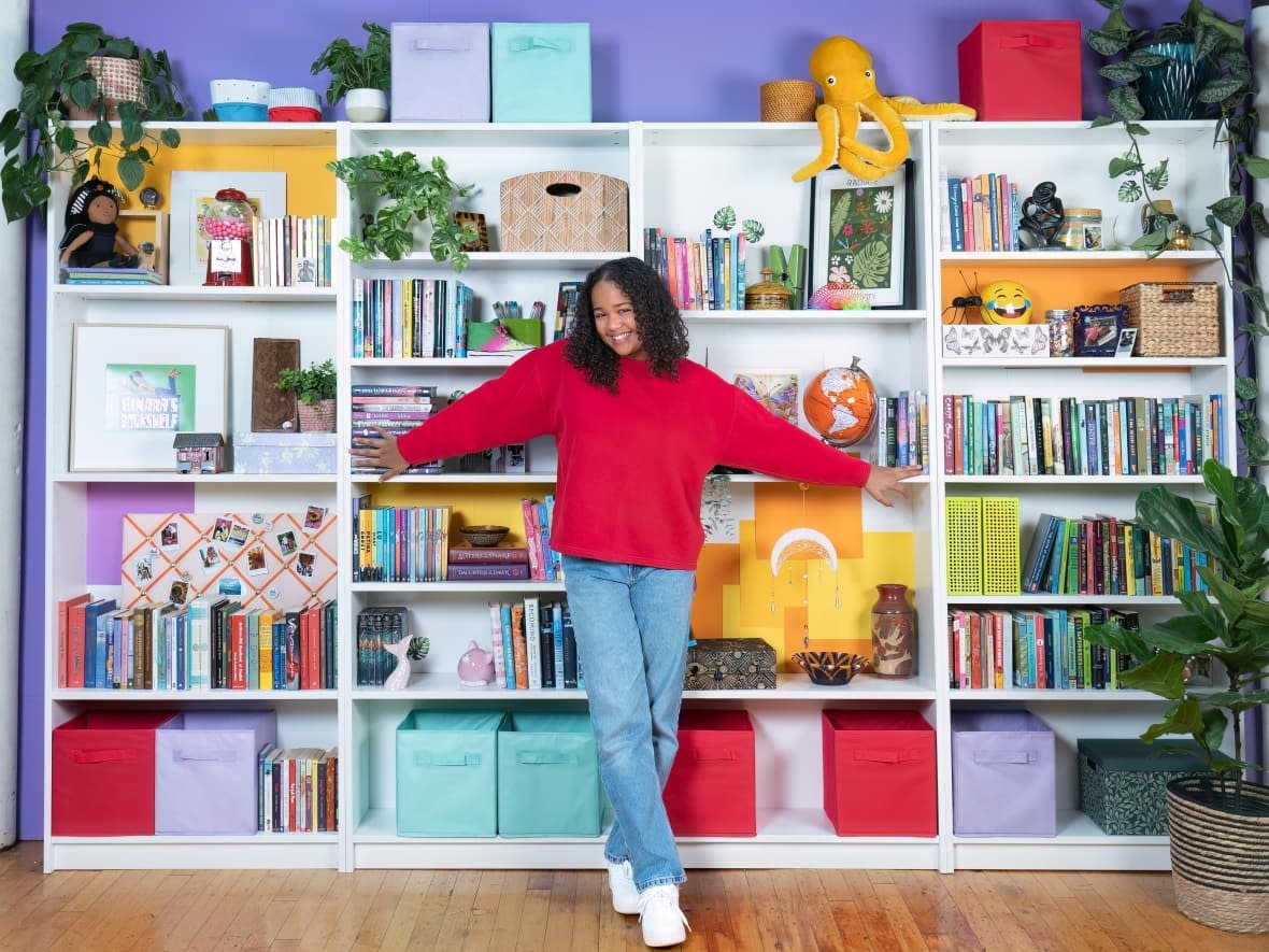 Ainara Alleyne started her project, Ainara's Bookshelf, on Instagram a couple of years ago. Now she's hosting her own series, which is set to air on TVOkids. (Submitted by Susan Stafford - image credit)