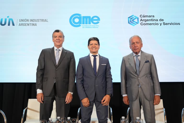 Mario Grinman (CAC),  Alfredo González (CAME) y Daniel Funes de Rioja (UIA)