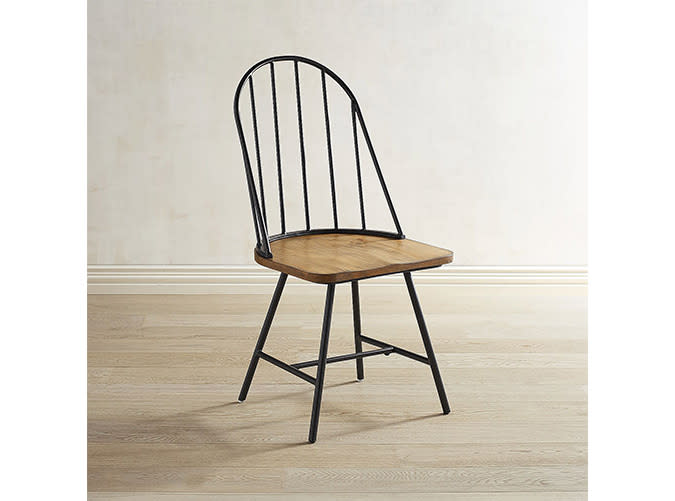<p>Leave it to Jo to make blackened bronze ladylike.</p> <p><a rel="nofollow noopener" href="http://www.pier1.com/magnolia-home-windsor-metal-hoop-dining-chair/3261513.html?cgid=magnolia-home" target="_blank" data-ylk="slk:Windsor Metal Hoop Dining Chair;elm:context_link;itc:0;sec:content-canvas" class="link "><em>Windsor Metal Hoop Dining Chair </em></a><em>($160)</em></p>