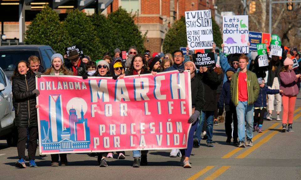 Participants in the anti-abortion Oklahoma March for Life march from the state Capitol on Saturday in Oklahoma City.