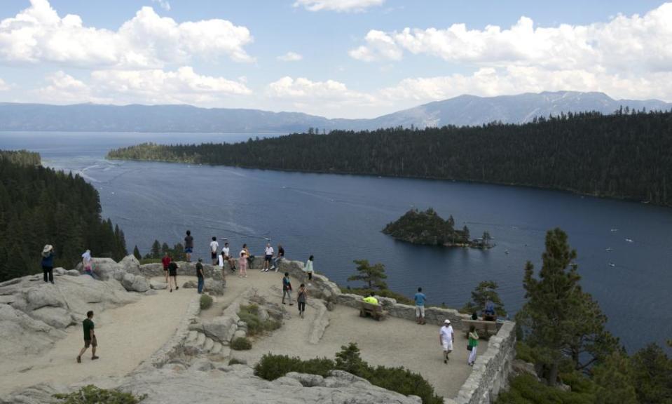 Visitors view Emerald Bay on the west shore of Lake Tahoe, near South Lake Tahoe, California, 8 August 2017.