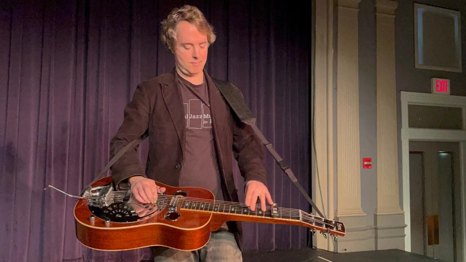 James Limerick Kerr playing his dobro at the Donald L. Oat Theater Friday, ahead of a show on Jan. 8.