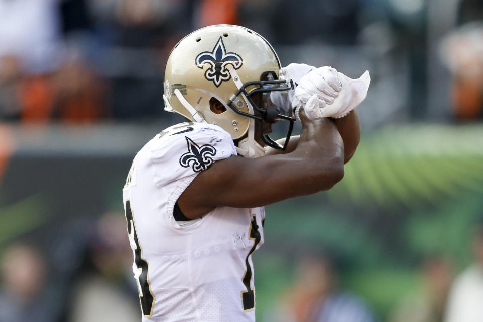 New Orleans Saints wide receiver Michael Thomas celebrates his touchdown in the first half of an NFL football game against the Cincinnati Bengals, Sunday, Nov. 11, 2018, in Cincinnati. (AP Photo/Gary Landers)2