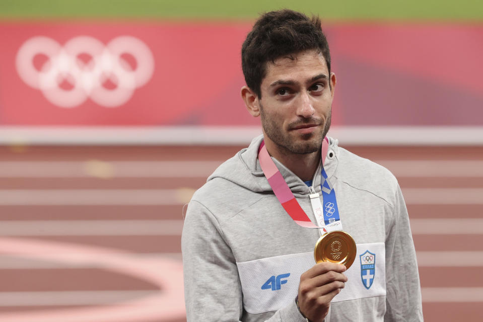 TOKYO, JAPAN - AUGUST 2: Gold Medalist Miltiadis Tentoglou of Greece during the medal ceremony of the Men's Long Jump on day ten of the athletics events of the Tokyo 2020 Olympic Games at Olympic Stadium on August 2, 2021 in Tokyo, Japan. (Photo by Jean Catuffe/Getty Images)