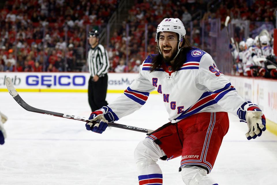 Mika Zibanejad of the New York Rangers reacts following  a first period goal by teammate Chris Kreider against the Carolina Hurricanes during Game 7.